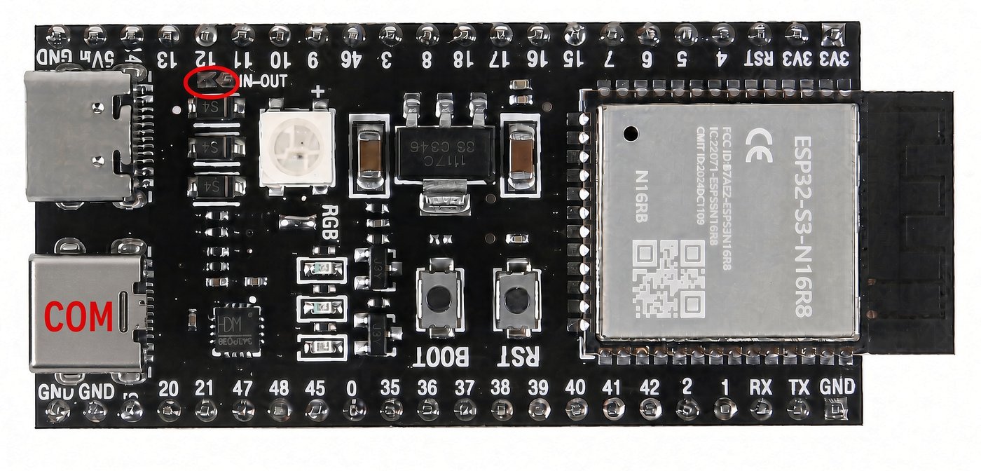 ESP32-S3 board with the COM port and 5V solder pad circled