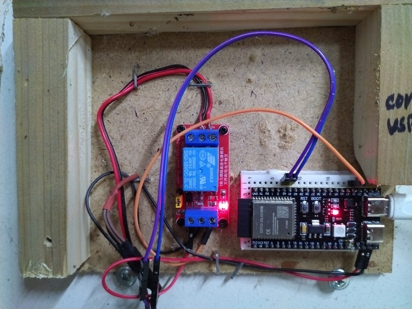 ESP32-S3 and relay wired and mounted at the opener